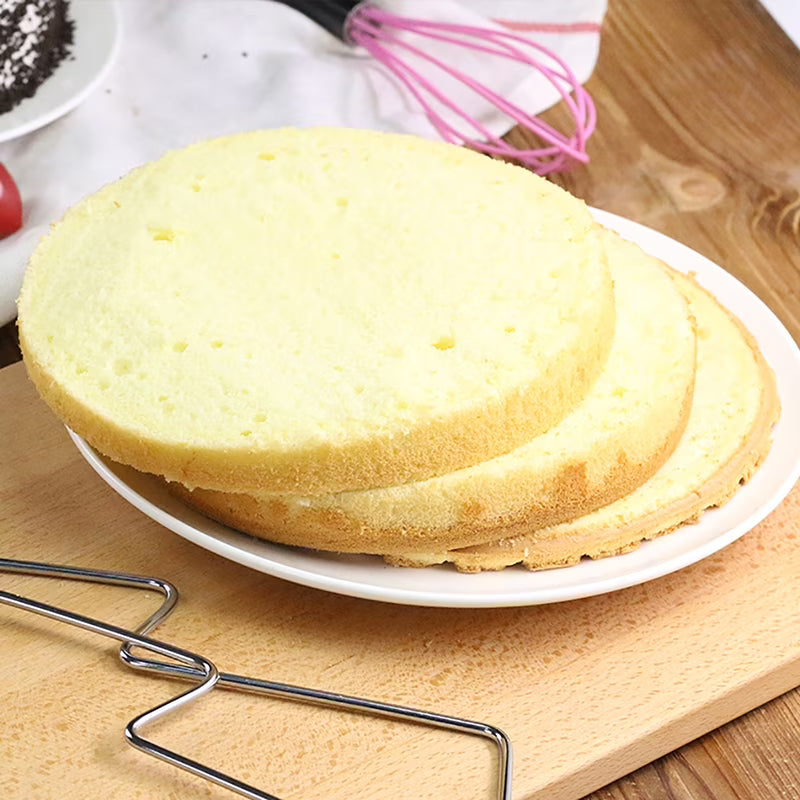 Cake wire leveler slicing sponge cake into even layers