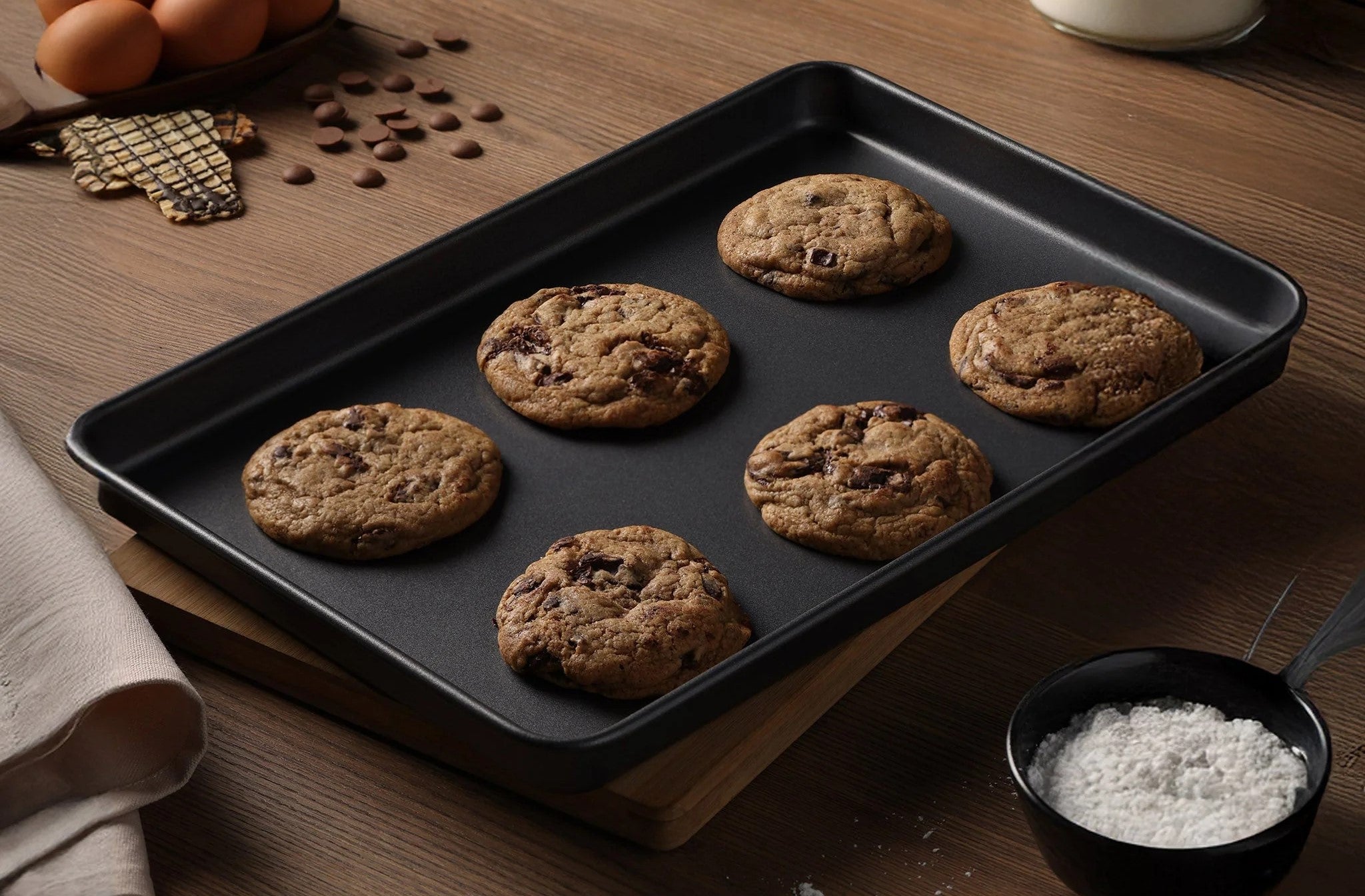 Freshly baked cookies on a non-stick baking sheet