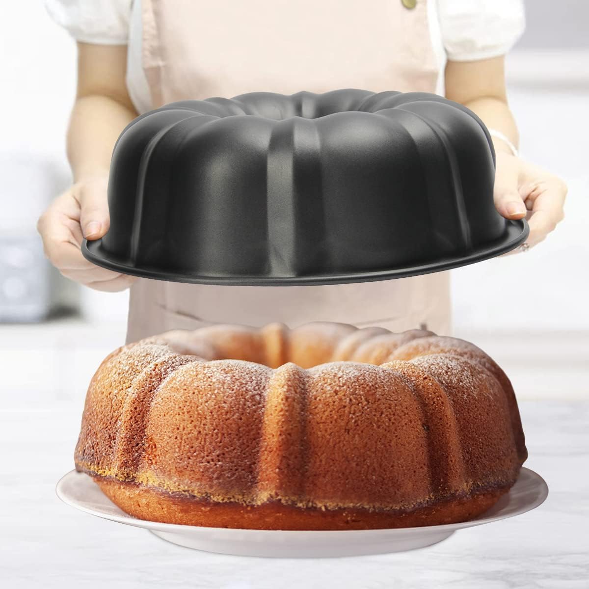 Golden Bundt cake baked in a fluted tube pan