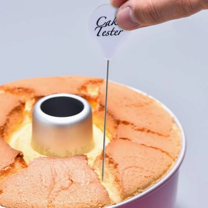 Stainless steel cake tester checking cake doneness